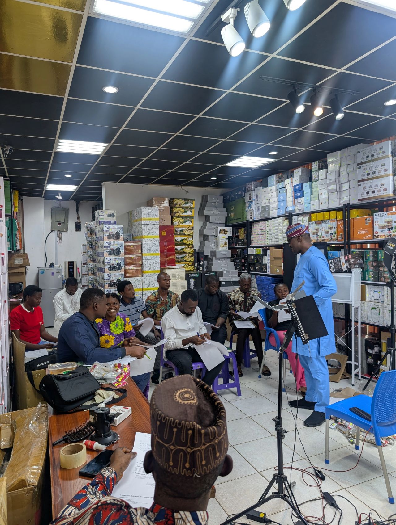 Daniel Isibor conducting inventory management training session